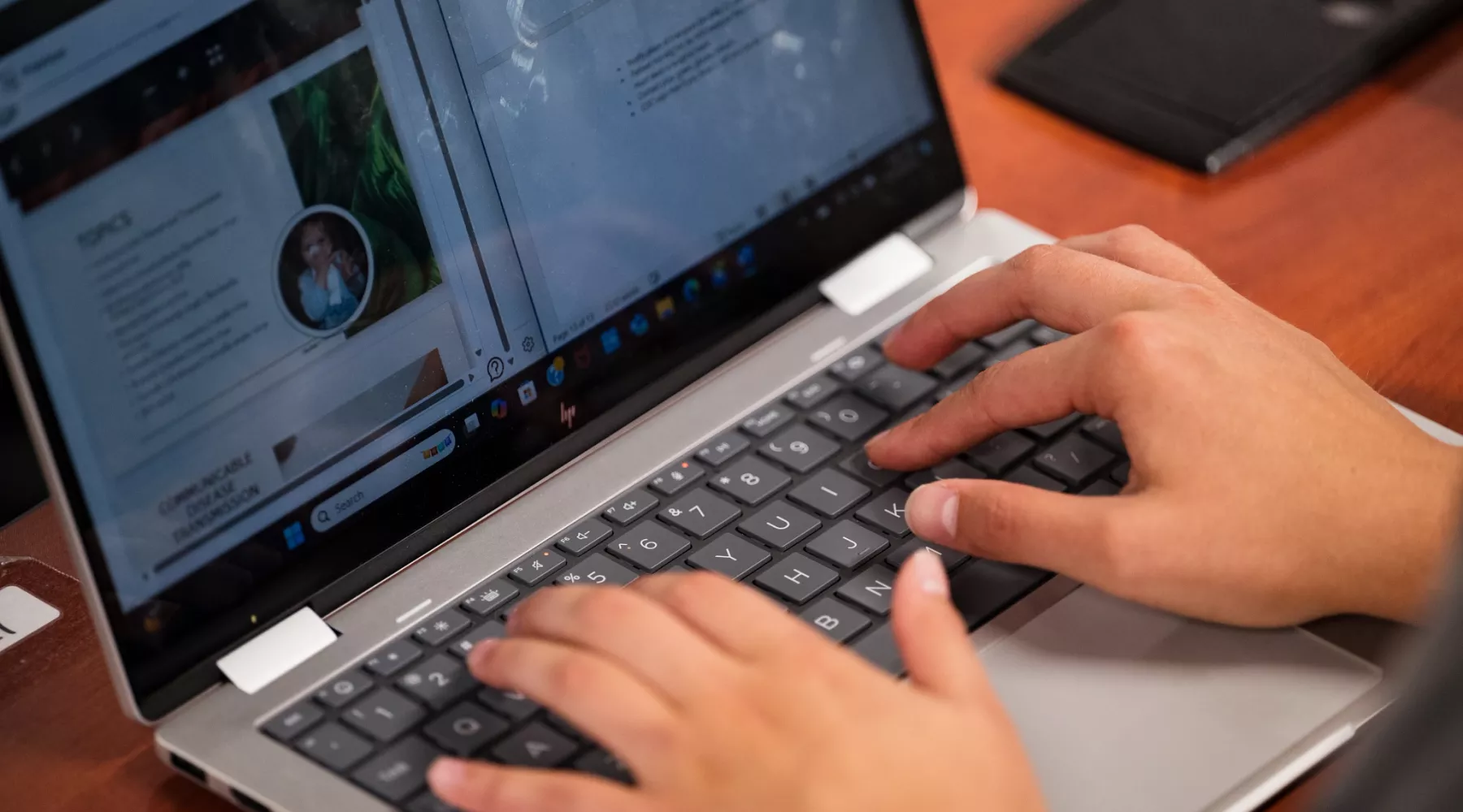 Students in a nursing lecture listening and taking notes.